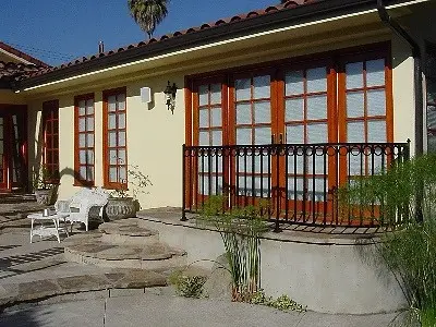 Room addition with French doors and balcony