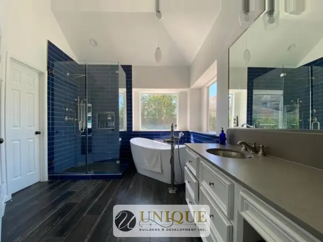 Remodeled bathroom by Unique Builders