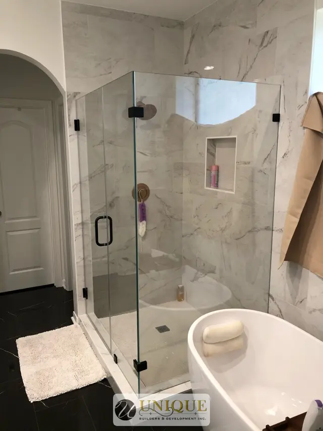Glass enclosed walk in shower
