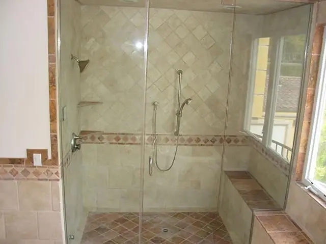 Tiled shower with glass door