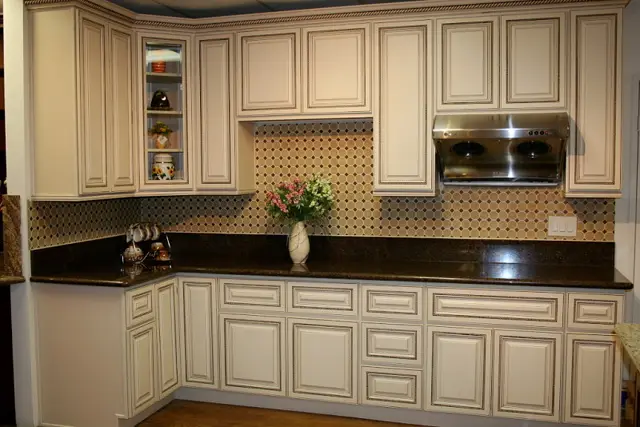 Kitchen with dark cabinets and granite